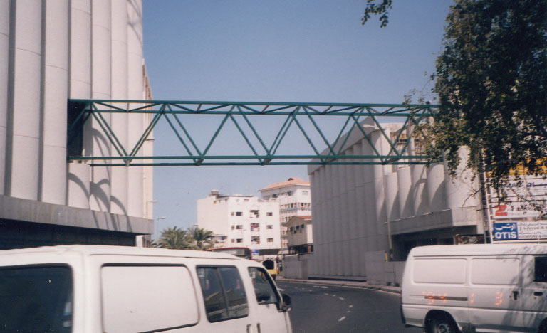 2000. The American Mission Hospital over bridge being built over the busy Isa Al Kabeer road in Manama
