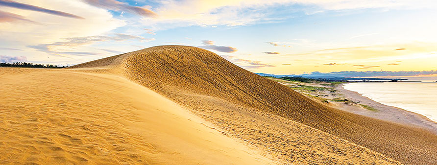 Tottori Sand Dunes landscape at sunset by the Sea of Japan