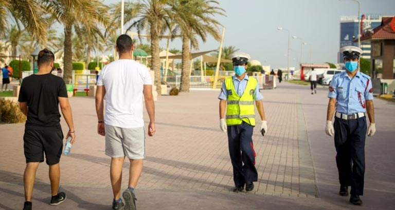 bahrain police promote public social distancing 