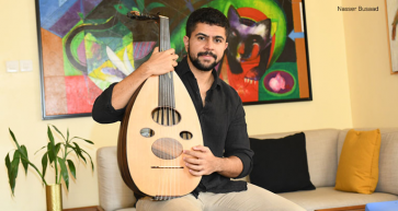 oud to player Nasser Busaad 